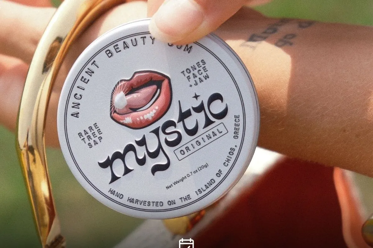 Mystic Gum tin in hand